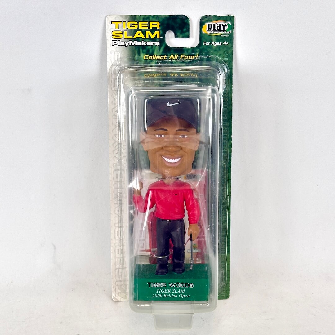 Bobblehead figure in packaging with 'Tiger Slam PlayMakers' branding on a white background