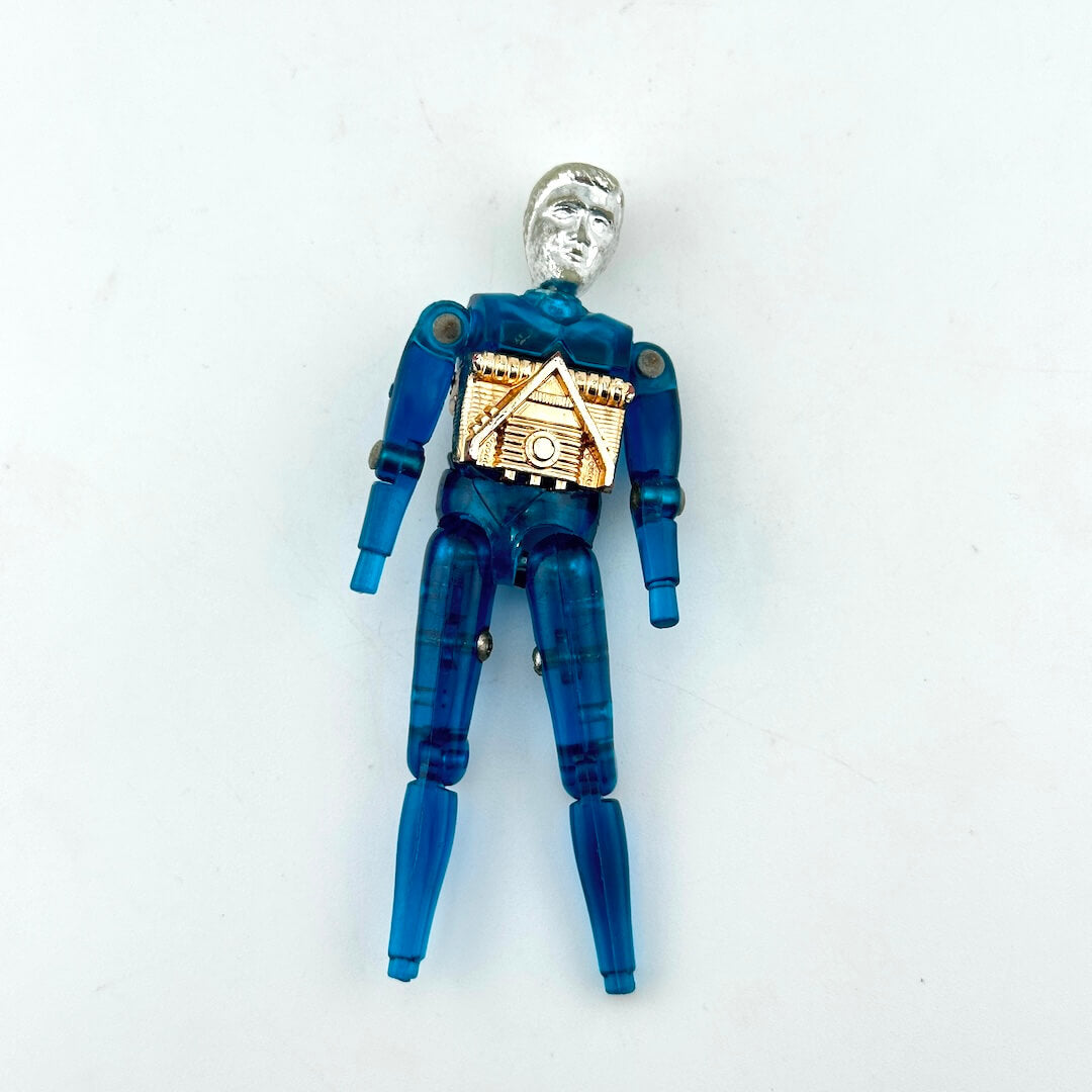 Blue and silver action figure laying on white background. 