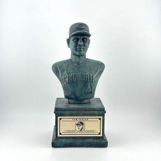 Bronze pedestal with bronze bust of Seaver in Cincinnati Reds uniform. Gold plaque on pedestal.