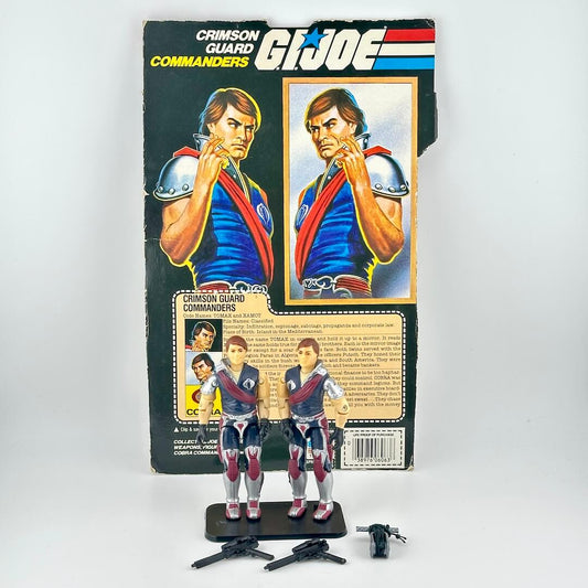 GI Joe action figures with card and accessories on white background. 