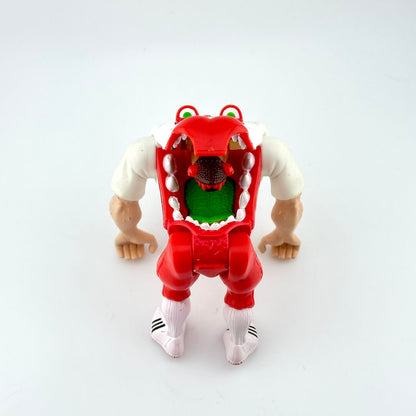 Toy figure with a red and white design on a light gray background