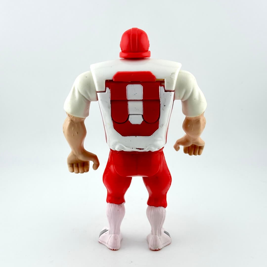Action figure with red and white outfit on a white background