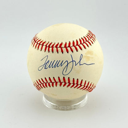 Baseball with a signature on a white background