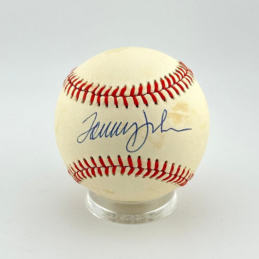 Baseball with a signature on a white background