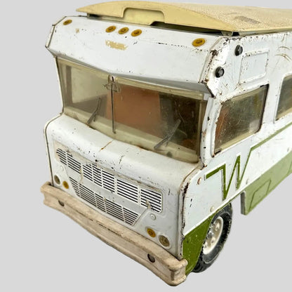 Model of a vintage camper van with a white and green color scheme on a white background