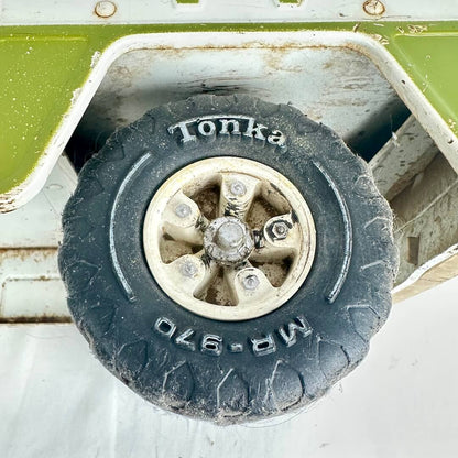Toy truck tire with 'Tonka' branding on a white background