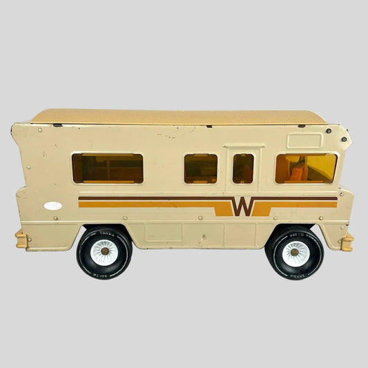 Beige toy camper with a logo on a white background