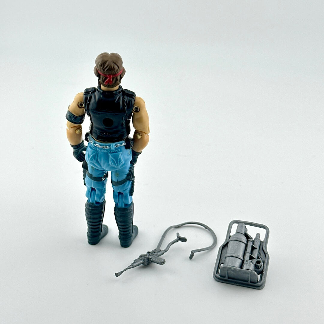 Action figure with accessories on a white background