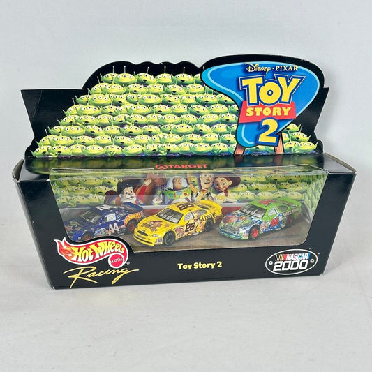 A boxed retail display set featuring Disney Pixar Toy Story 2 sign on top and NASCAR 2000 branding.