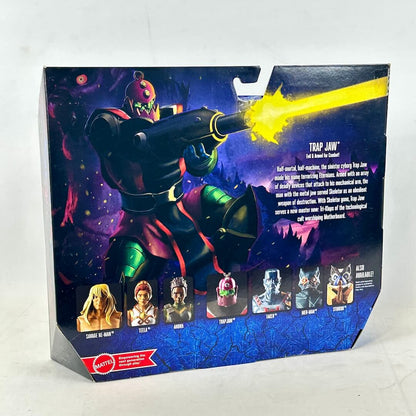 Back of a Mattel Trap Jaw action figure box with an illustrated figure, product text, & a row of figure heads along the bottom.