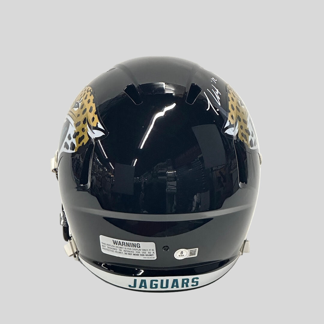 Black helmet with Jaguar logo on a white background