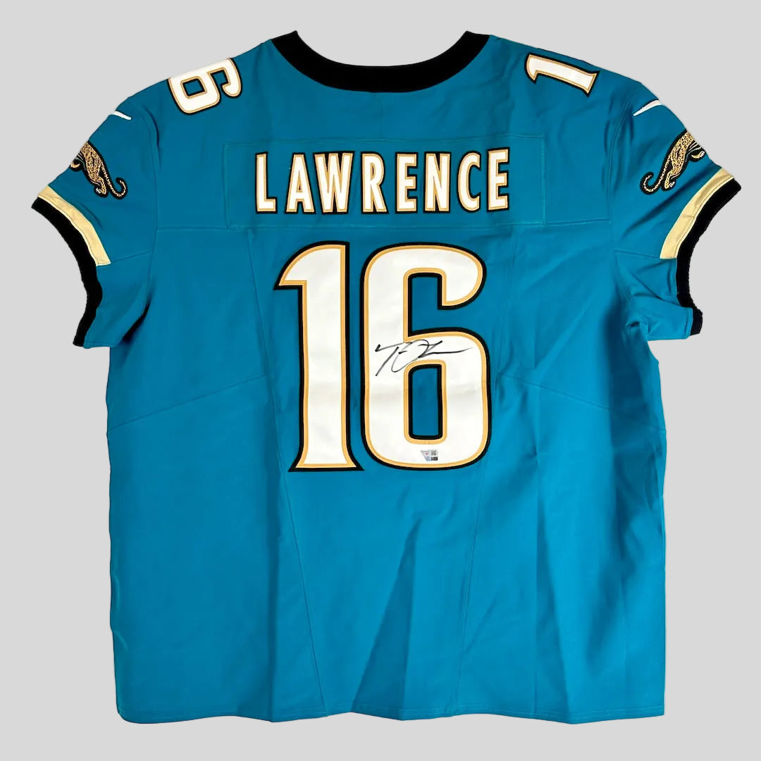A blue Jacksonville Jaguars football jersey shown from the back, featuring the name LAWRENCE and number 16.