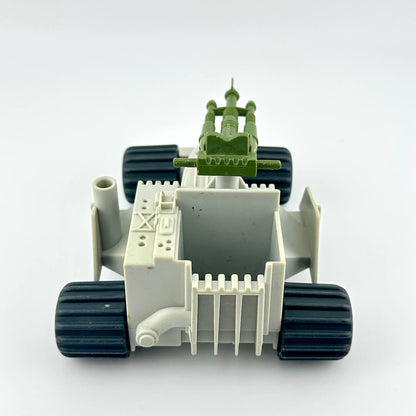 Toy military vehicle with green missiles on a white background