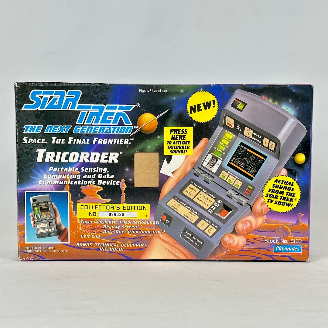 Star Trek Tricorder toy packaging on a gray background