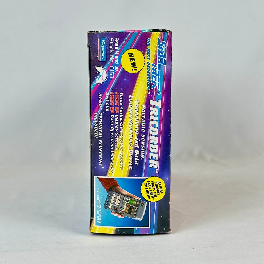 Star Trek Tricorder toy packaging on a gray background