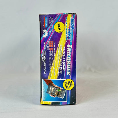 Star Trek Tricorder toy packaging on a gray background