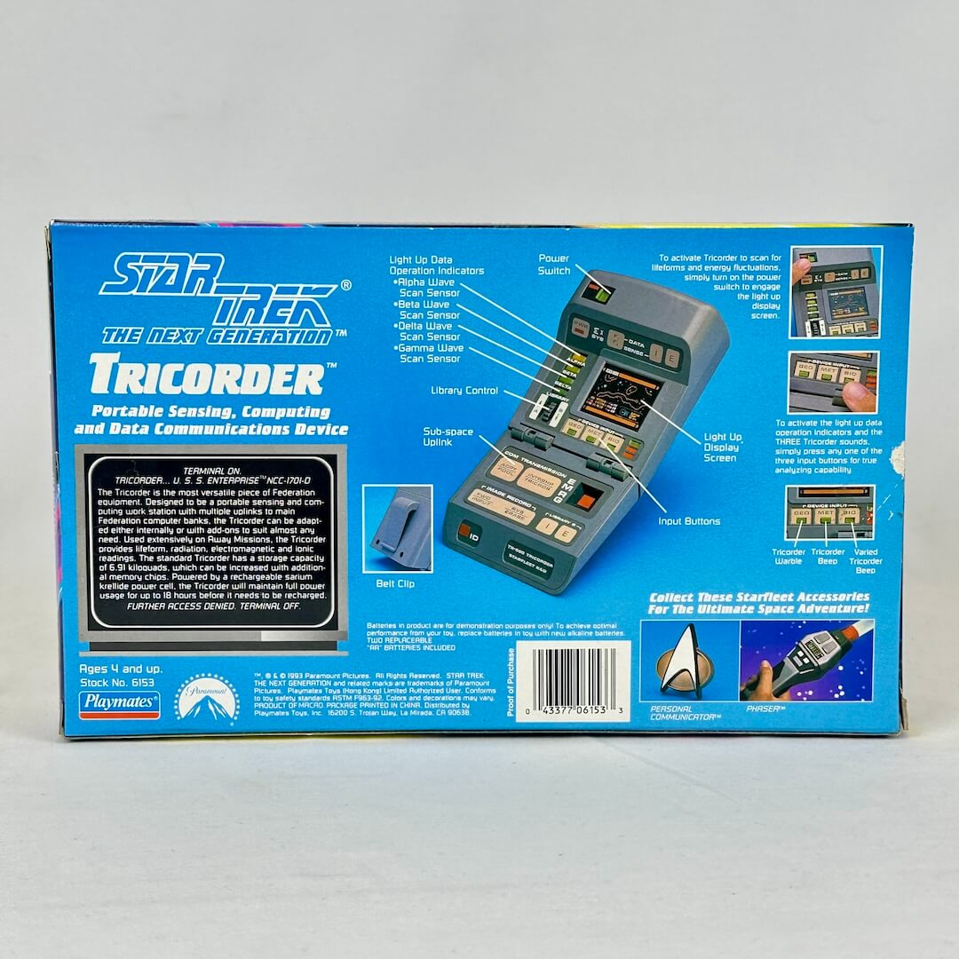 Star Trek Tricorder toy packaging on a gray background