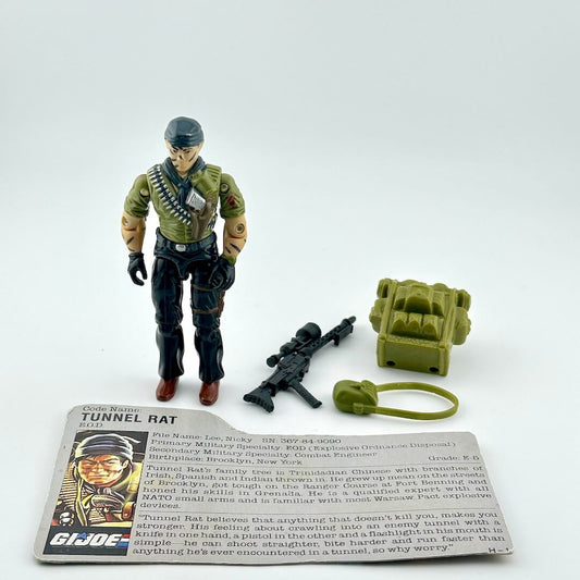 Toy figure of a Tunnel Rat with accessories and card on a white background