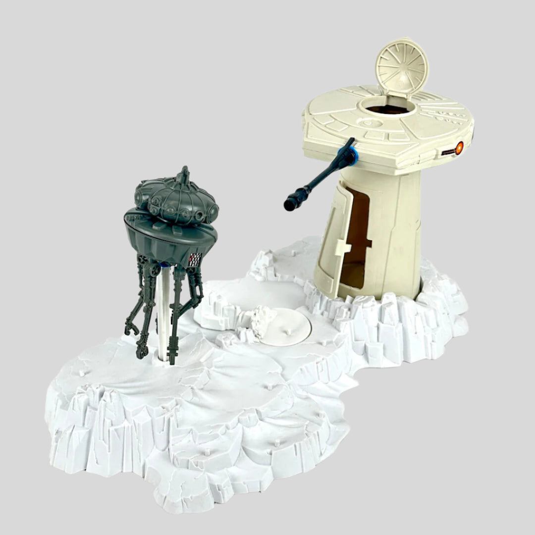 Toy set with a turret tower and a robot on a white background