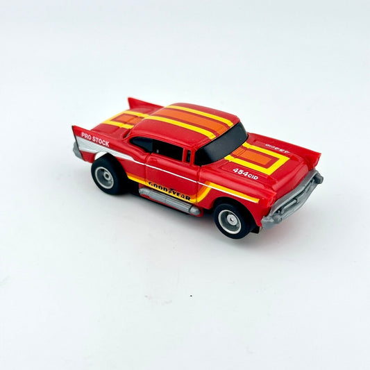 Red and yellow toy car on a white background