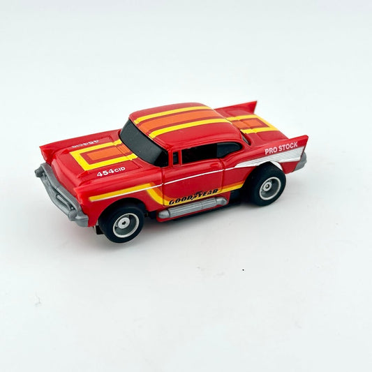 Red and yellow toy car with 'Pro Stock' and 'Goodyear' branding on a white background