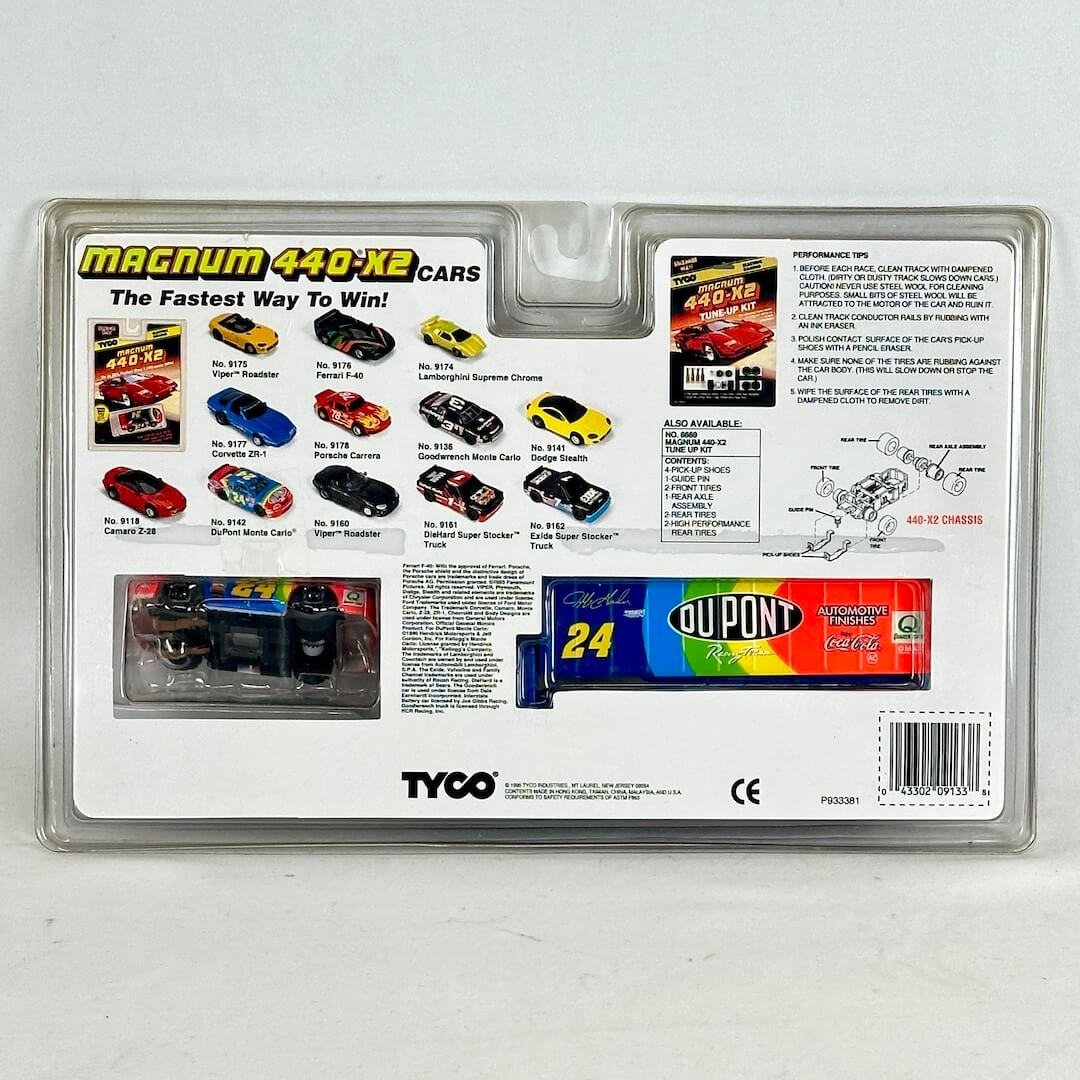 Tyco Magnum 440-X2 toy car packaging with various toy cars displayed on a white background.