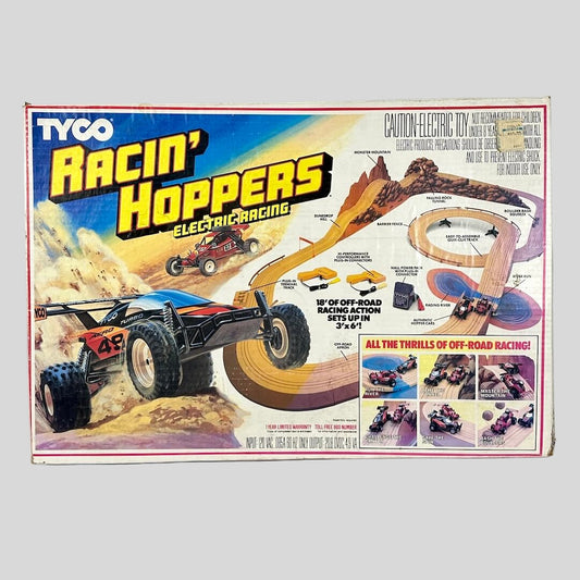 Box of Tyco Racin' Hoppers electric racing toy set on a white background