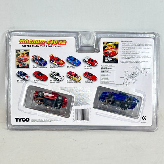 Toy car set packaging with multiple cars and TYCO branding on a gray background