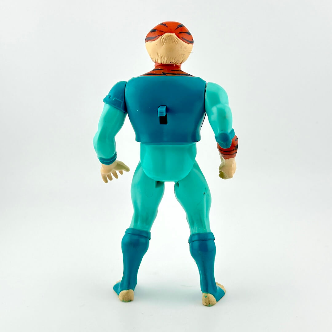 Toy figure with blue suit and tiger-like head on a white background