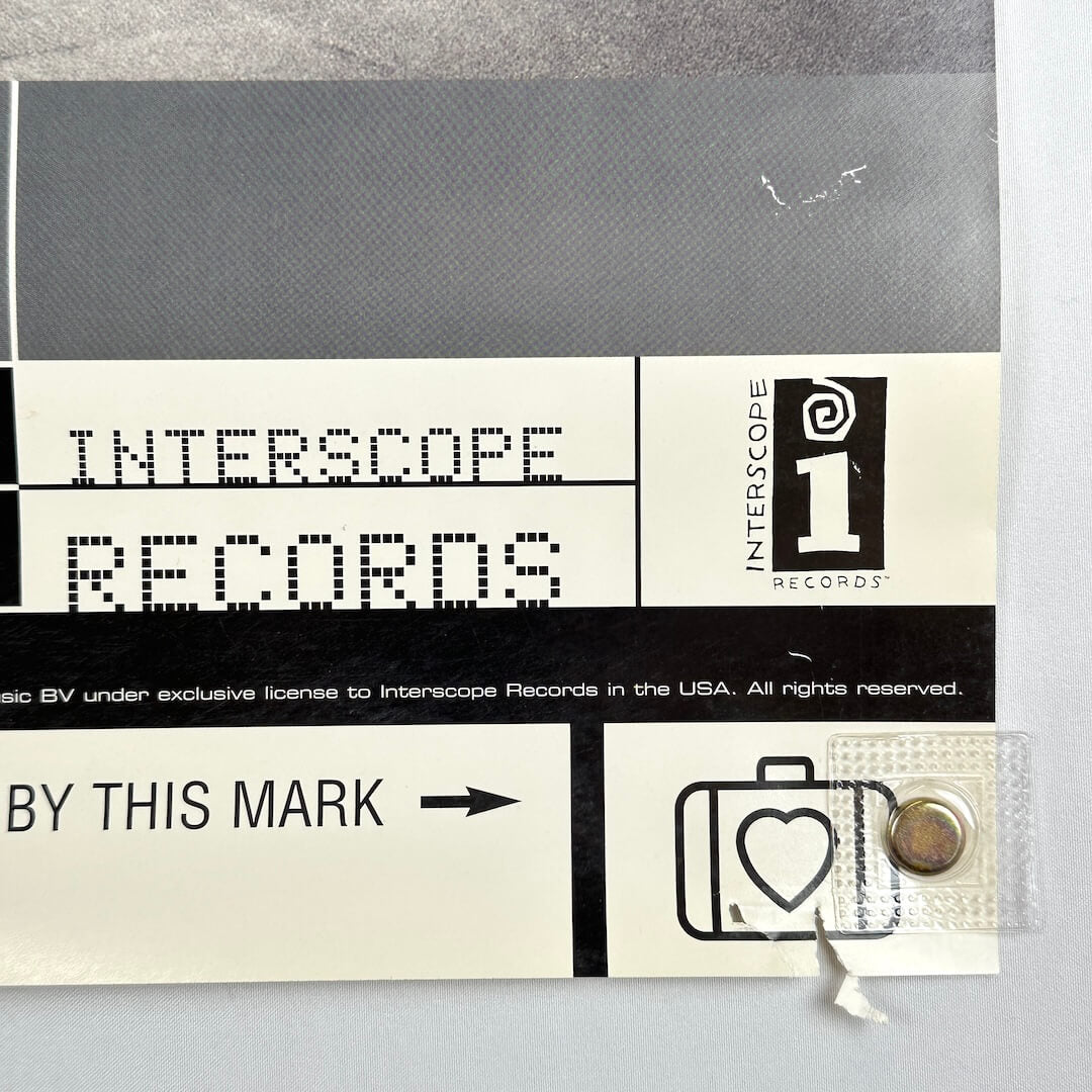 Bottom right corner of poster with pin hole and tear, some scuff to face