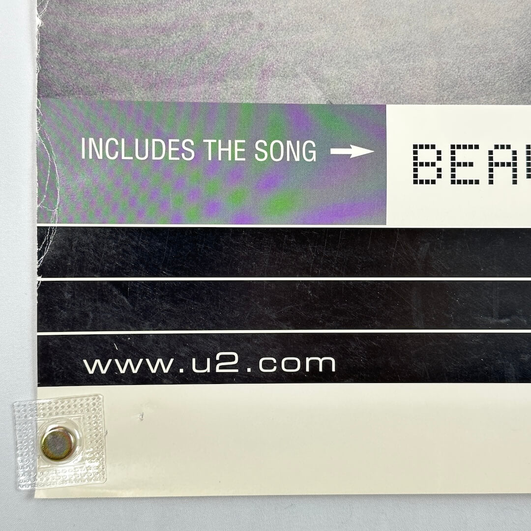 Bottom left corner of poster with edge wear and some minor damage