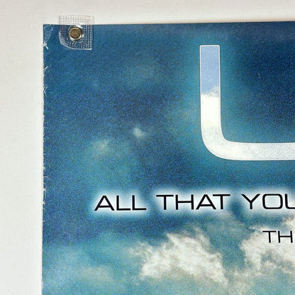 Top left corner of poster showing edge wear but no holes