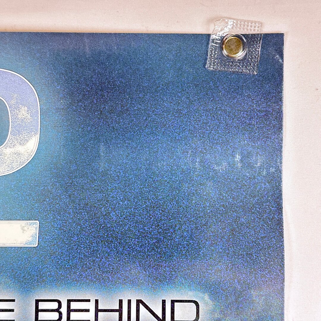 Top right corner of poster with some edge wear but good corner.