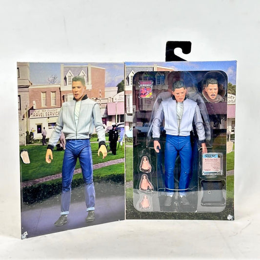 Action figure with packaging in front of a small town backdrop