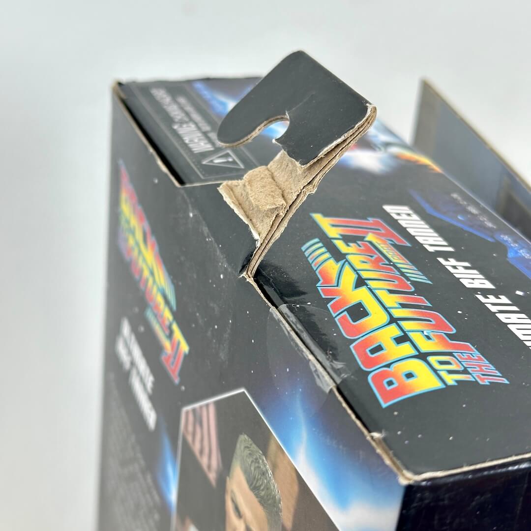 Back to the Future toy figure packaging with torn corner