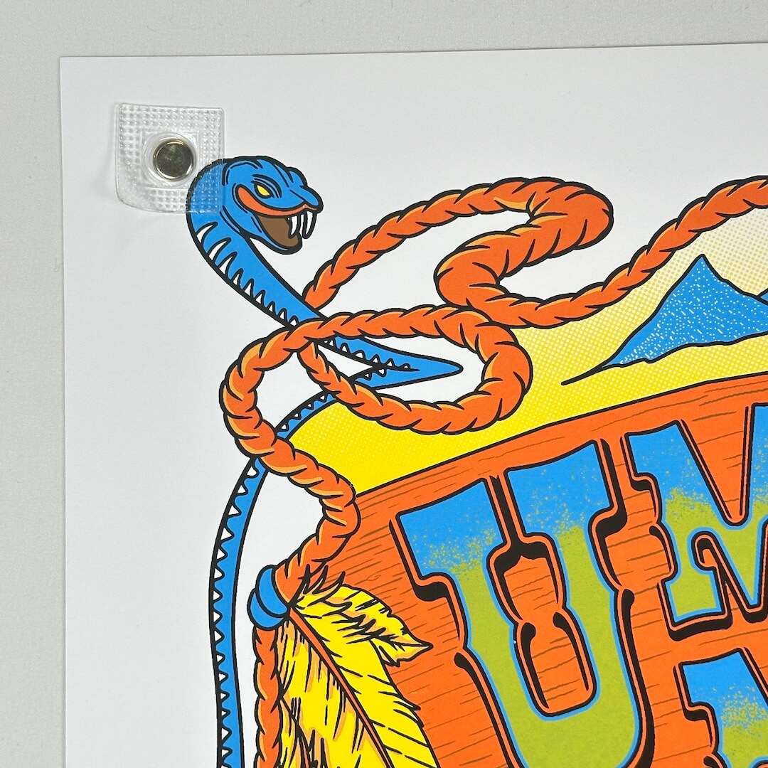 Top left corner of poster showing no damage to face, corner or edges. 