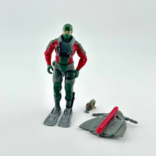 GI Joe action figure with accessories against white background. 