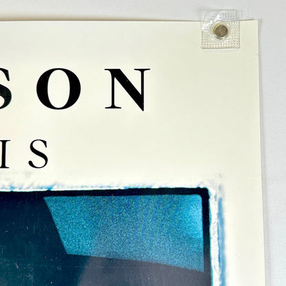 Top right corner of poster with no obvious damage