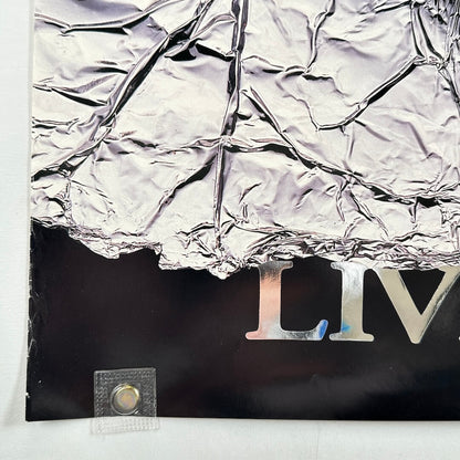 Bottom left corner with some wear.