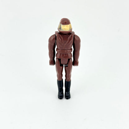 Action figure in brown flight suit with helmet on white background. 