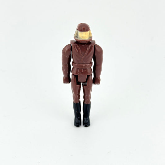 Action figure in brown flight suit with helmet on white background. 