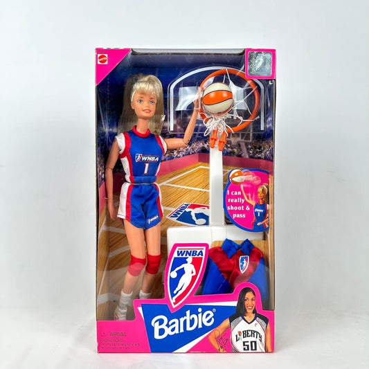 Barbie doll in WNBA uniform with basketball hoop and ball in packaging
