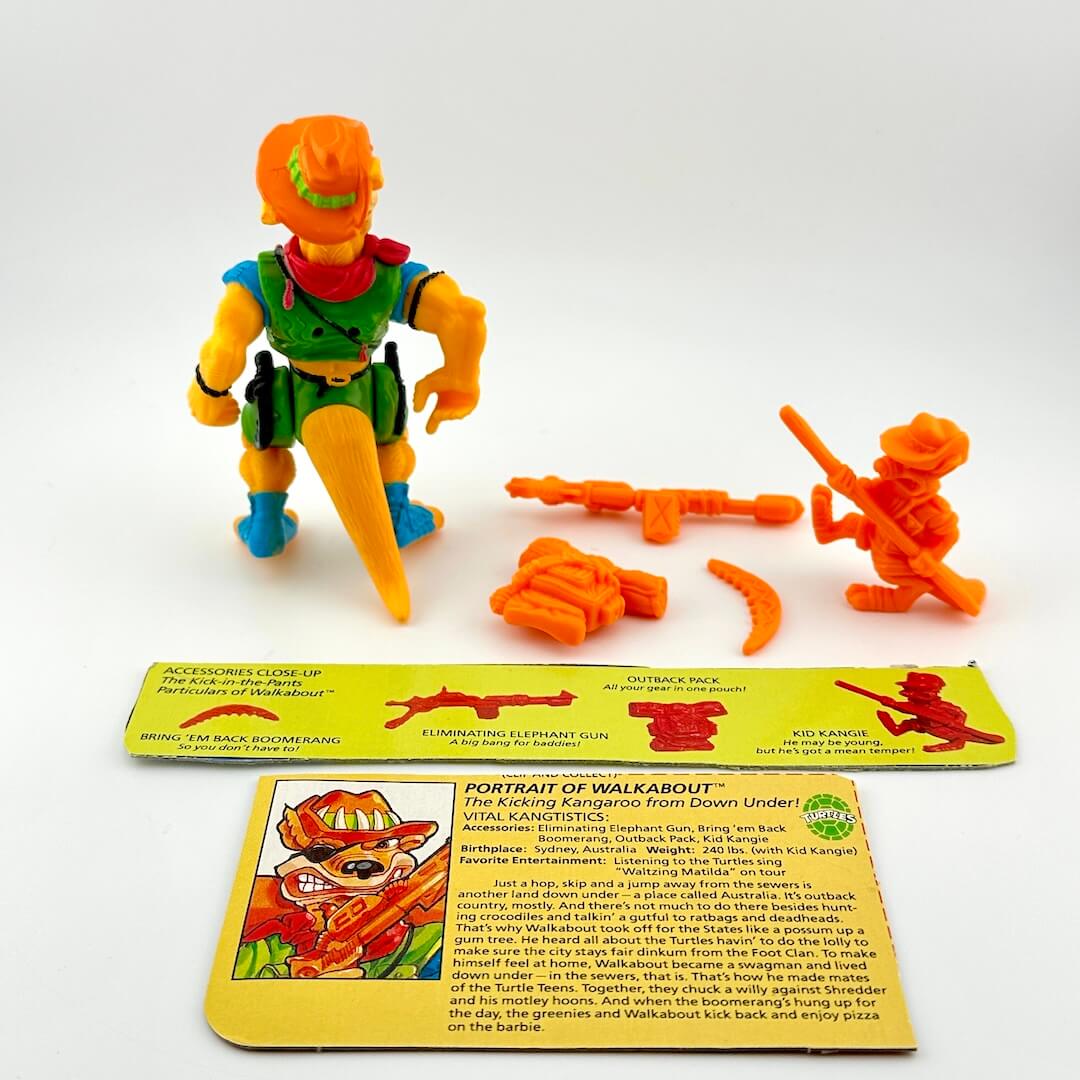 TMNT action figure with card back and accessories against white background. 