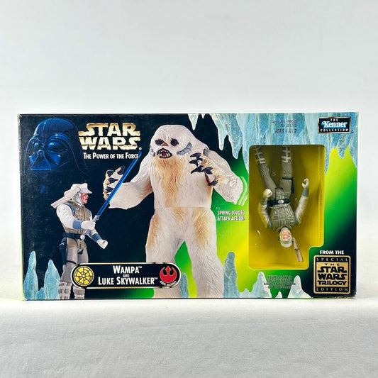Star Wars toy packaging with figure in window of box. Box features image of Wampa & Skywalker in ice cave. 