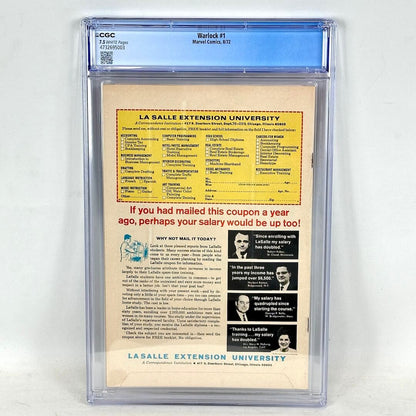 Backside of encapsulated comic book featuring an ad for a university on white background. 
