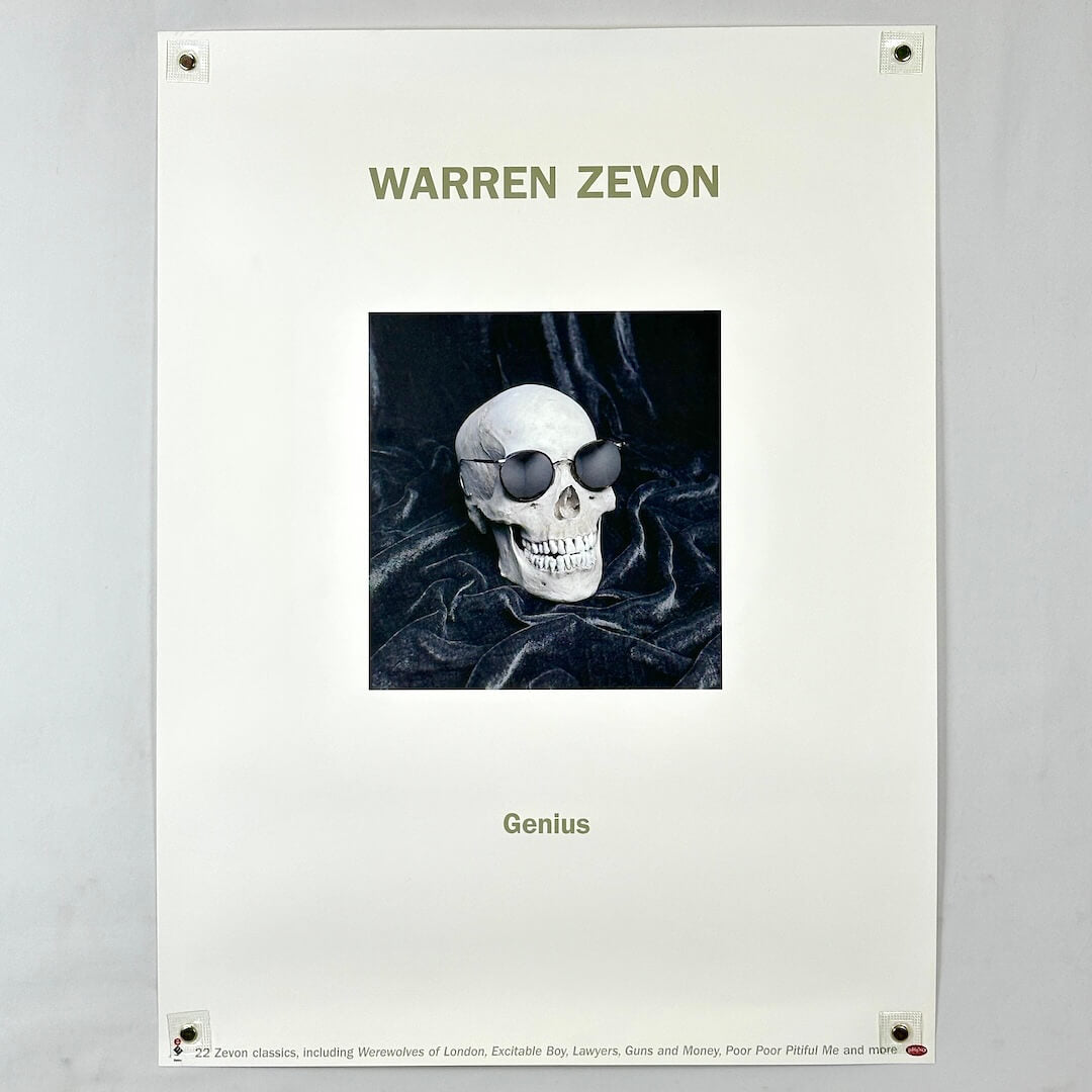 Poster of Warren Zevon with a skull and sunglasses design on a white background