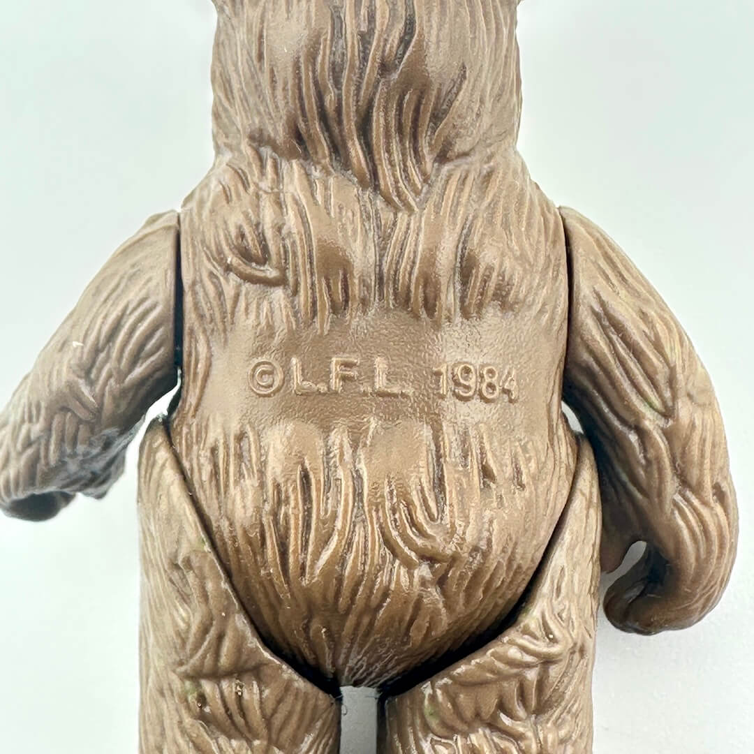 Close-up of back of figure to show copyright information. 