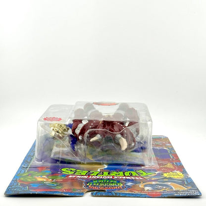 Toy figure in packaging on a colorful display card with a white background