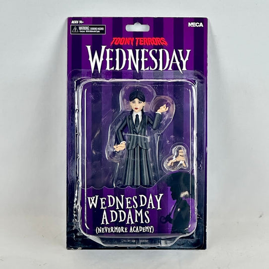 Action figure packaging of Wednesday Addams from the Addams Family series on a white background