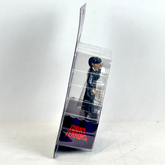 Action figure in a clear packaging with 'Toony Terrors' branding on a white background